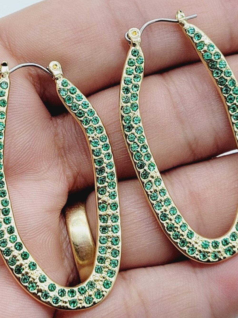 Wavy Hoop Earrings Gold Tone Oval Embellished In Green Rhinestones